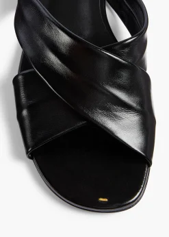 Liria Flat Sandal in Black Glazed Leather