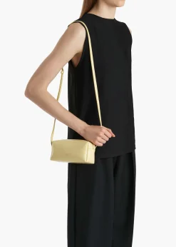 Mini Kye Crossbody Bag in Pale Yellow Crackle Patent Leather