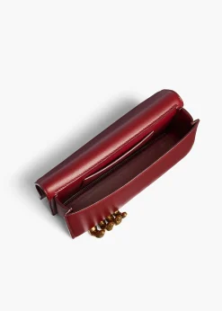 Sculpted Hand Clutch in Oxblood Leather