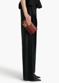 Sculpted Hand Clutch in Oxblood Leather